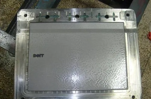 谈模具腐蚀皮纹工艺的原理及流程